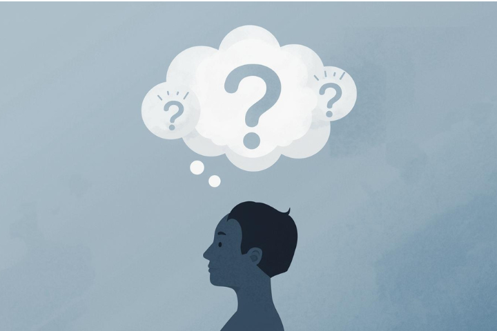 Person with thought bubbles containing question marks above their head